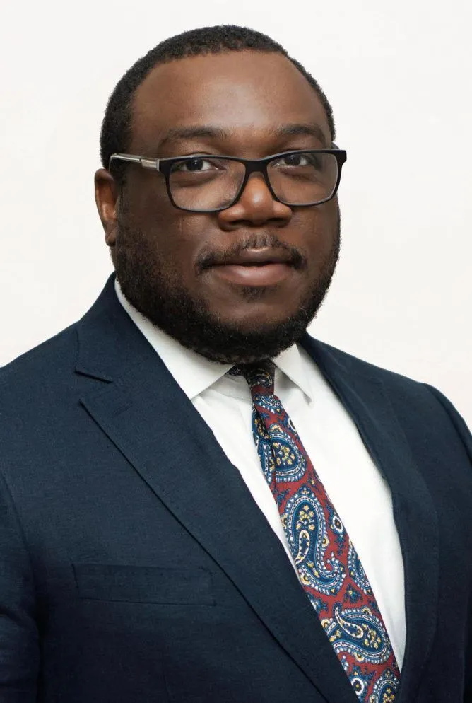 Mr. Rhoni Ikhide